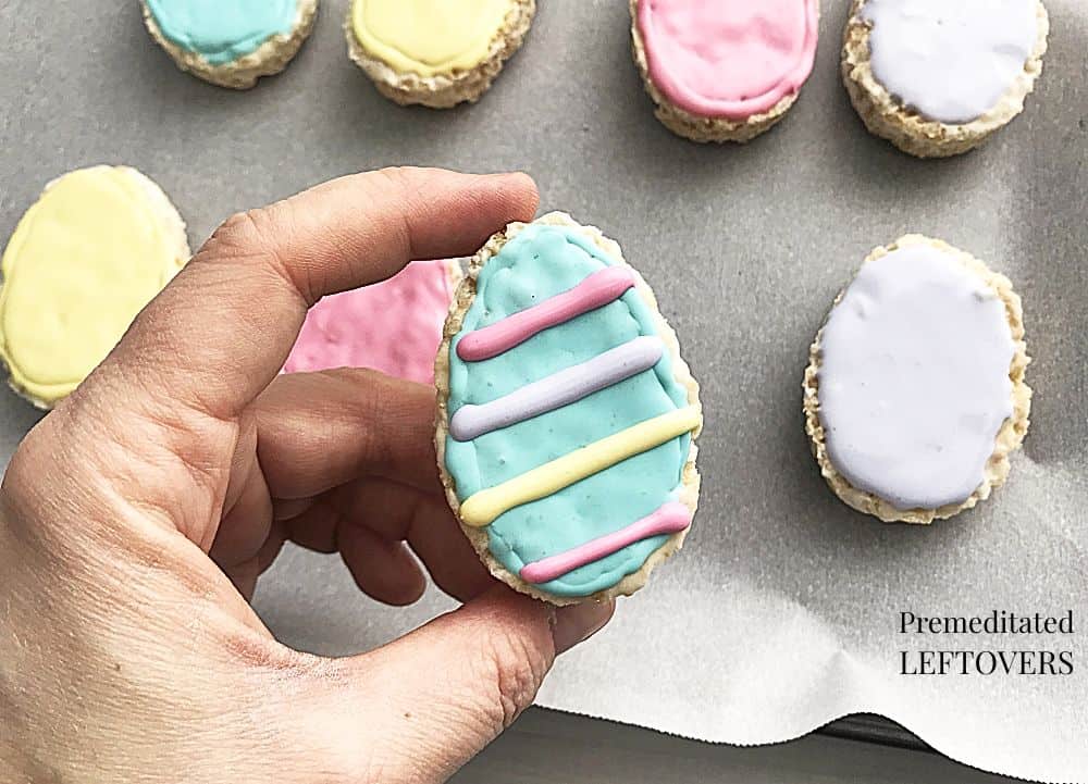 Decorating Egg shaped Rice Krispie Treats to look like sugar cookies.