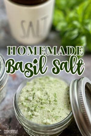 A batch of this homemade basil salt recipe in jar.