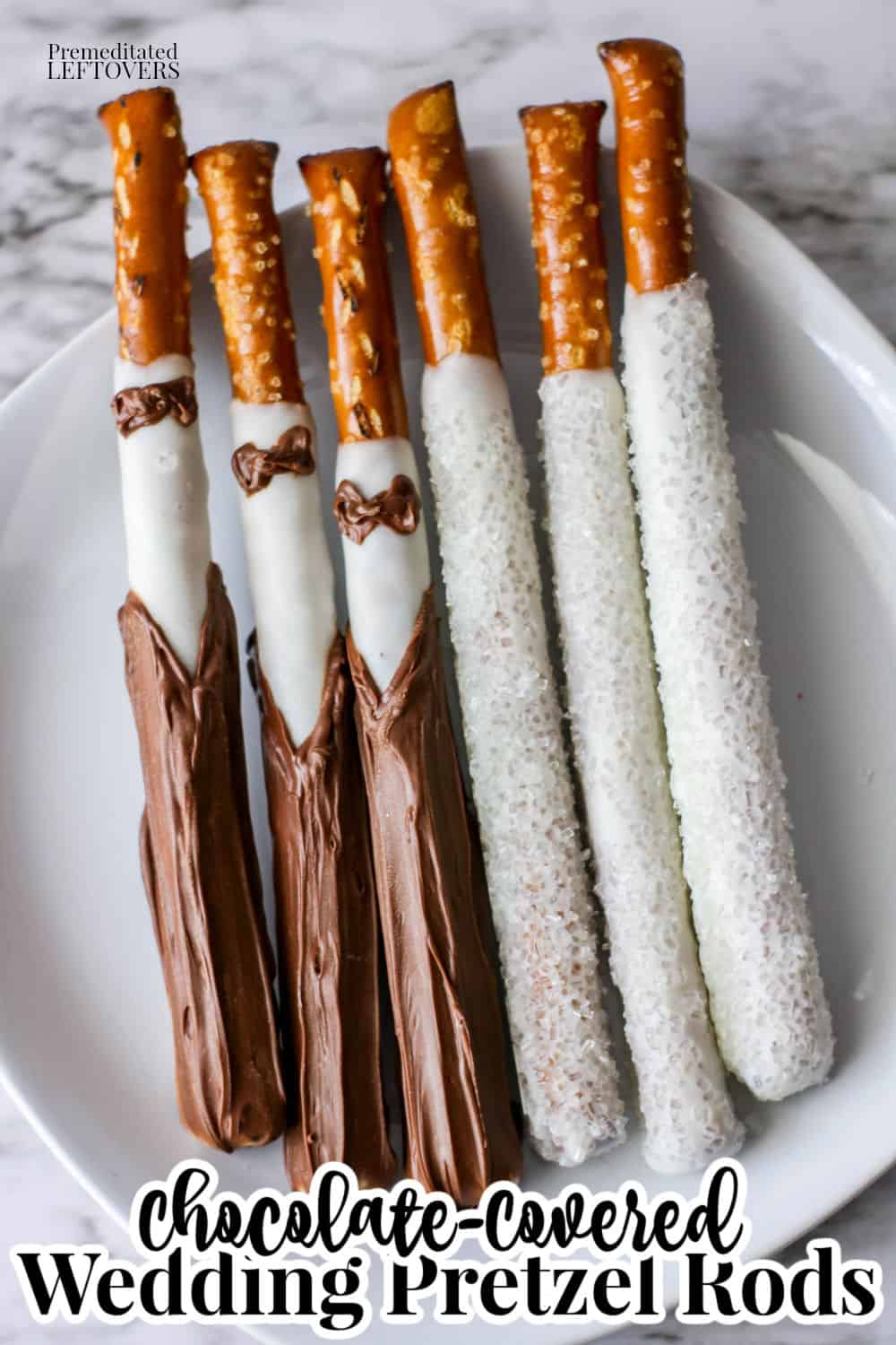 chocolate covered wedding pretzel rods that look like a bride and groom