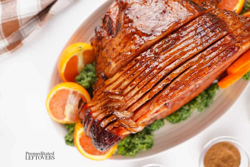 homemade honey baked ham on a platter